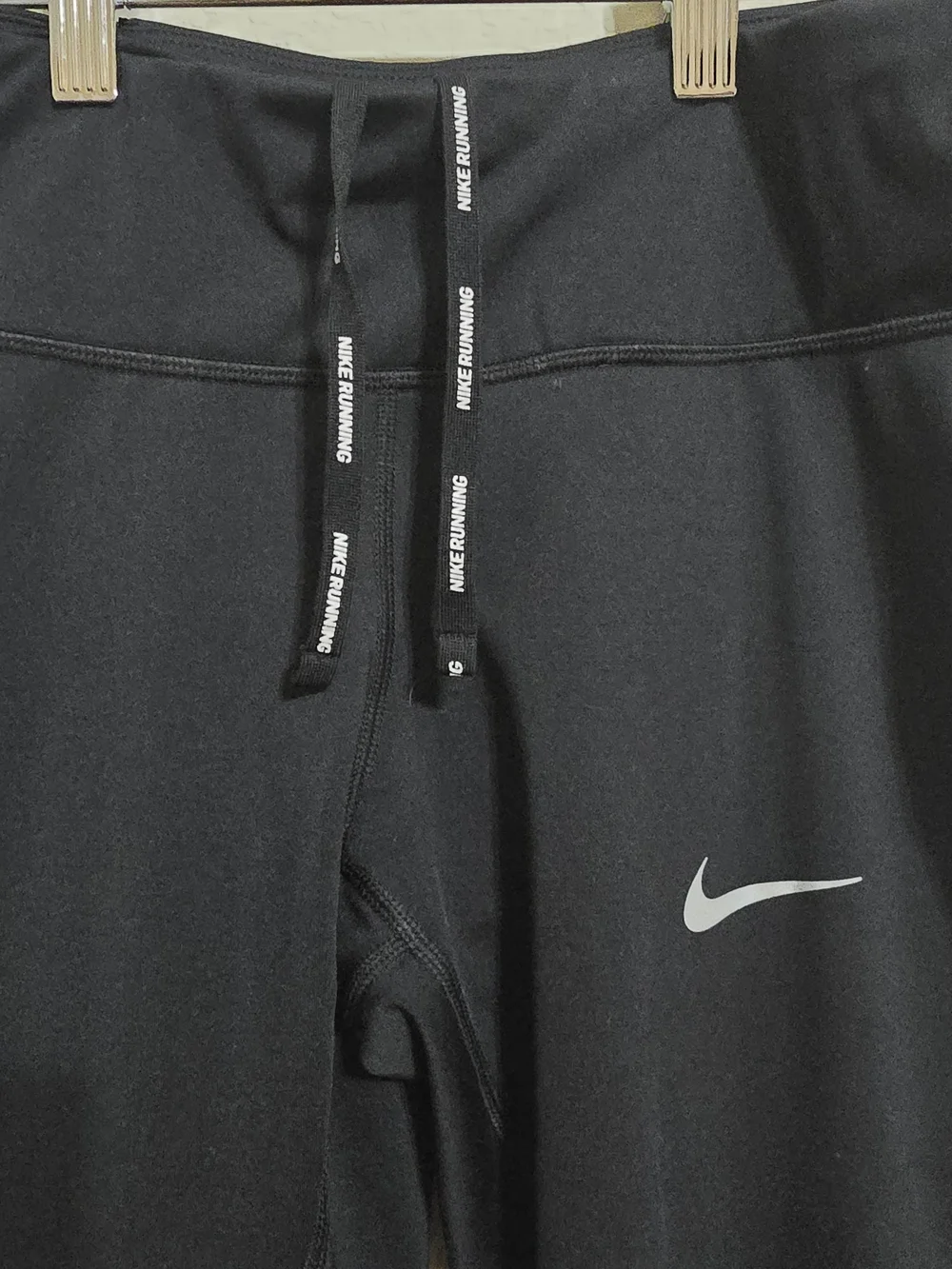 Nike Women's Black Athletic Leggings with Reflective Swoosh